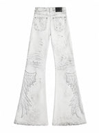The Distressed Wing Patch Flare Jeans