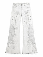 The Distressed Wing Patch Flare Jeans