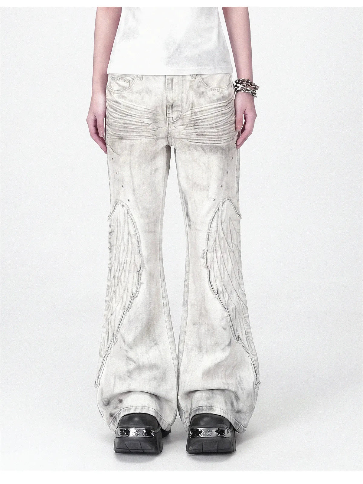 The Distressed Wing Patch Flare Jeans